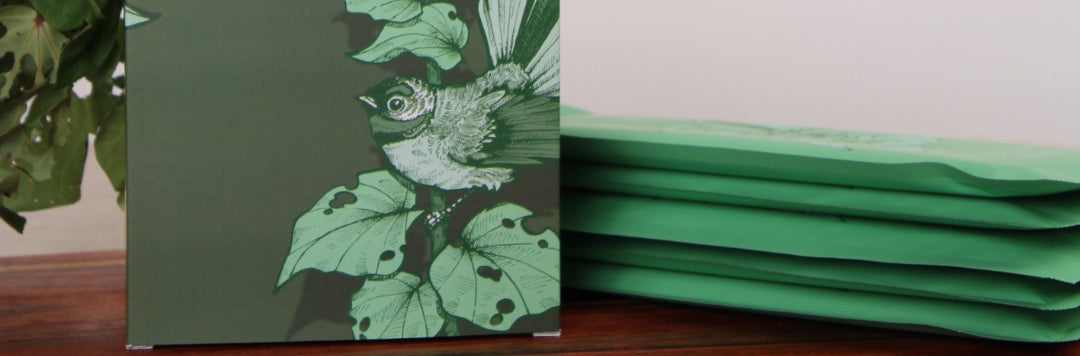 Green box of 'honest skincare' Restore Melting Mask with botanical design on a wooden surface.
