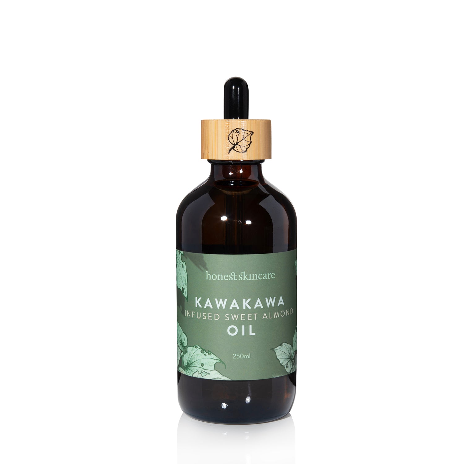 Bottle of Kawakawa Infused Sweet Almond Oil with a dropper on a white background