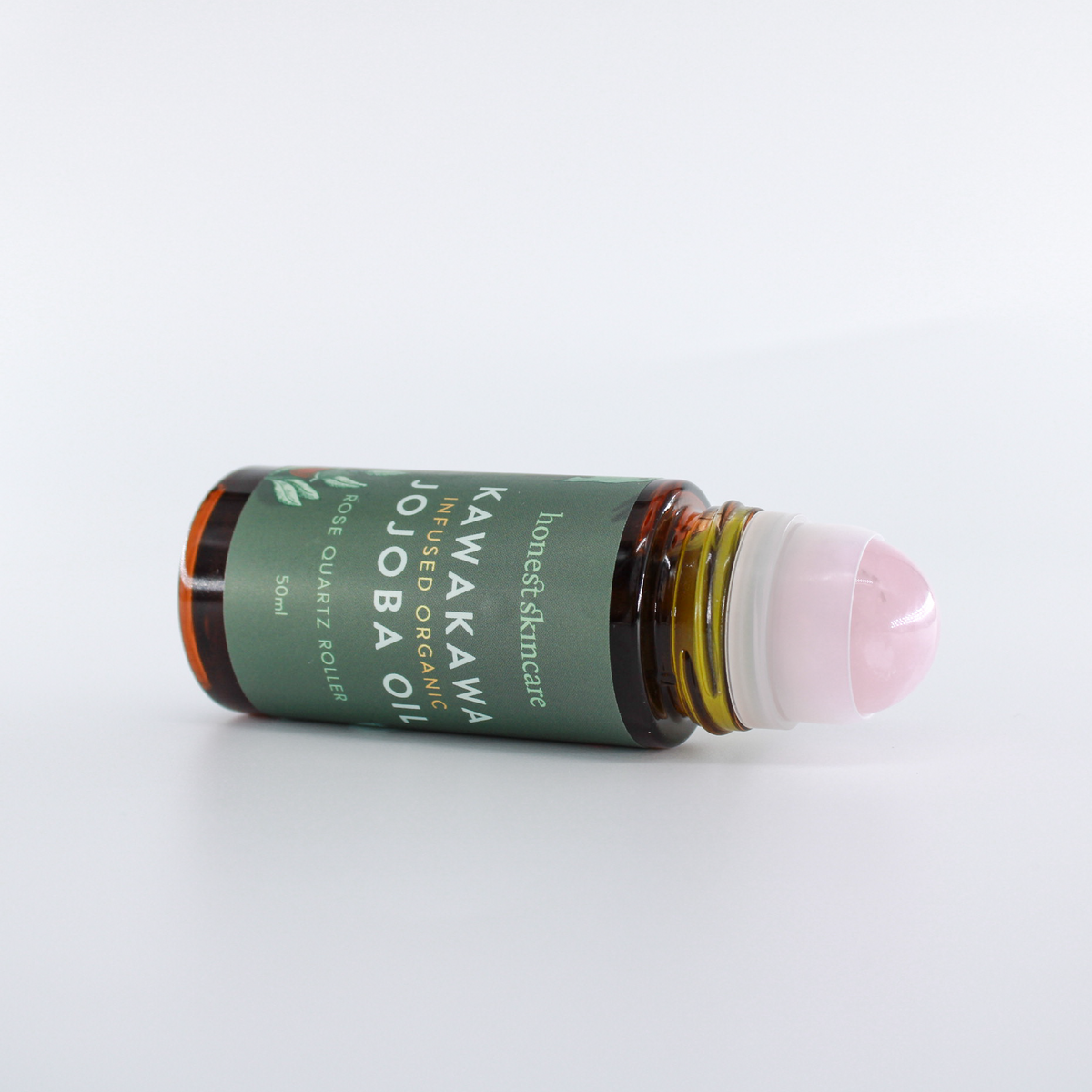Kawakawa_Jojoba_Oil_Quartz_Roller_upsidedown