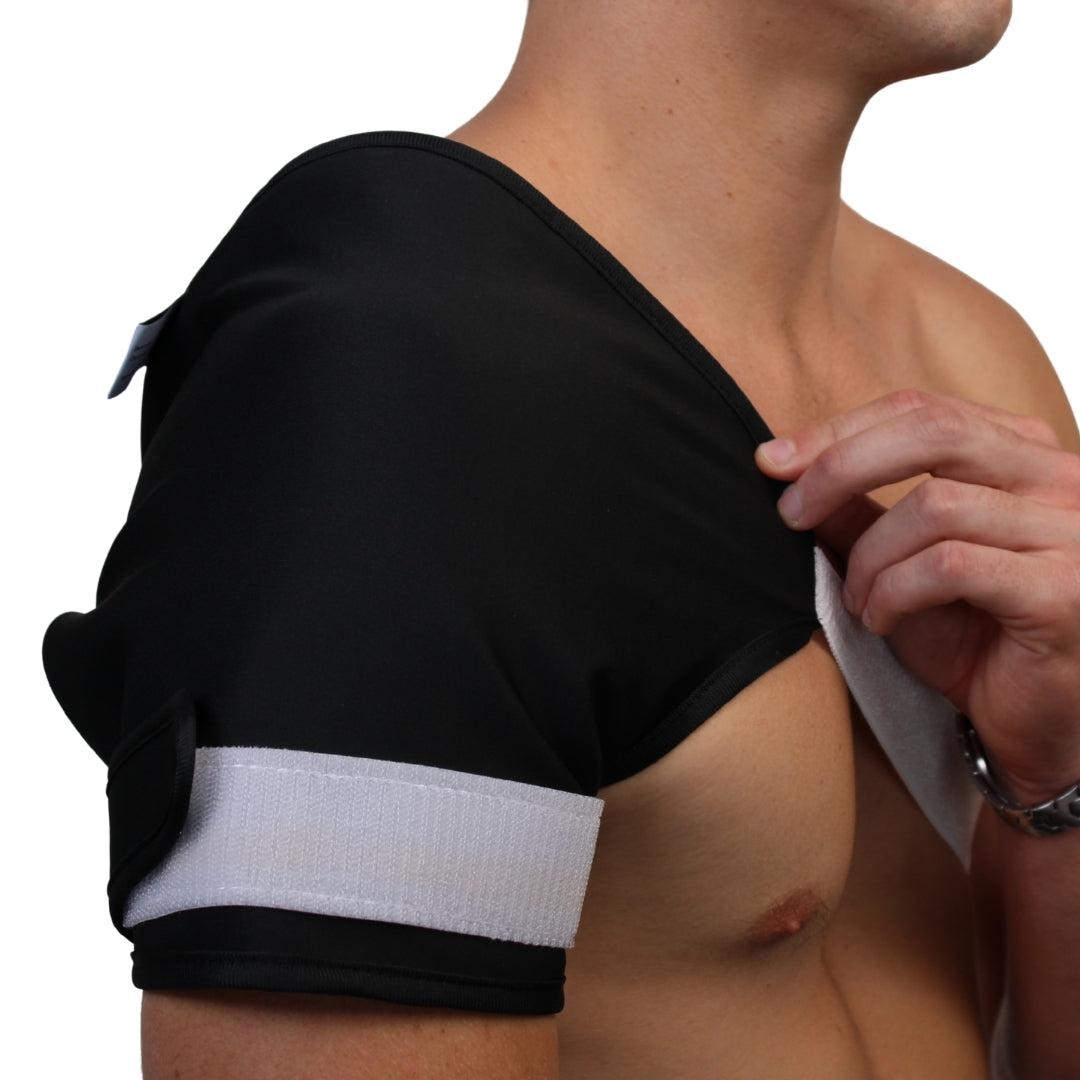 Person wearing a black honest skincare shoulder wrap with white trim on a white background