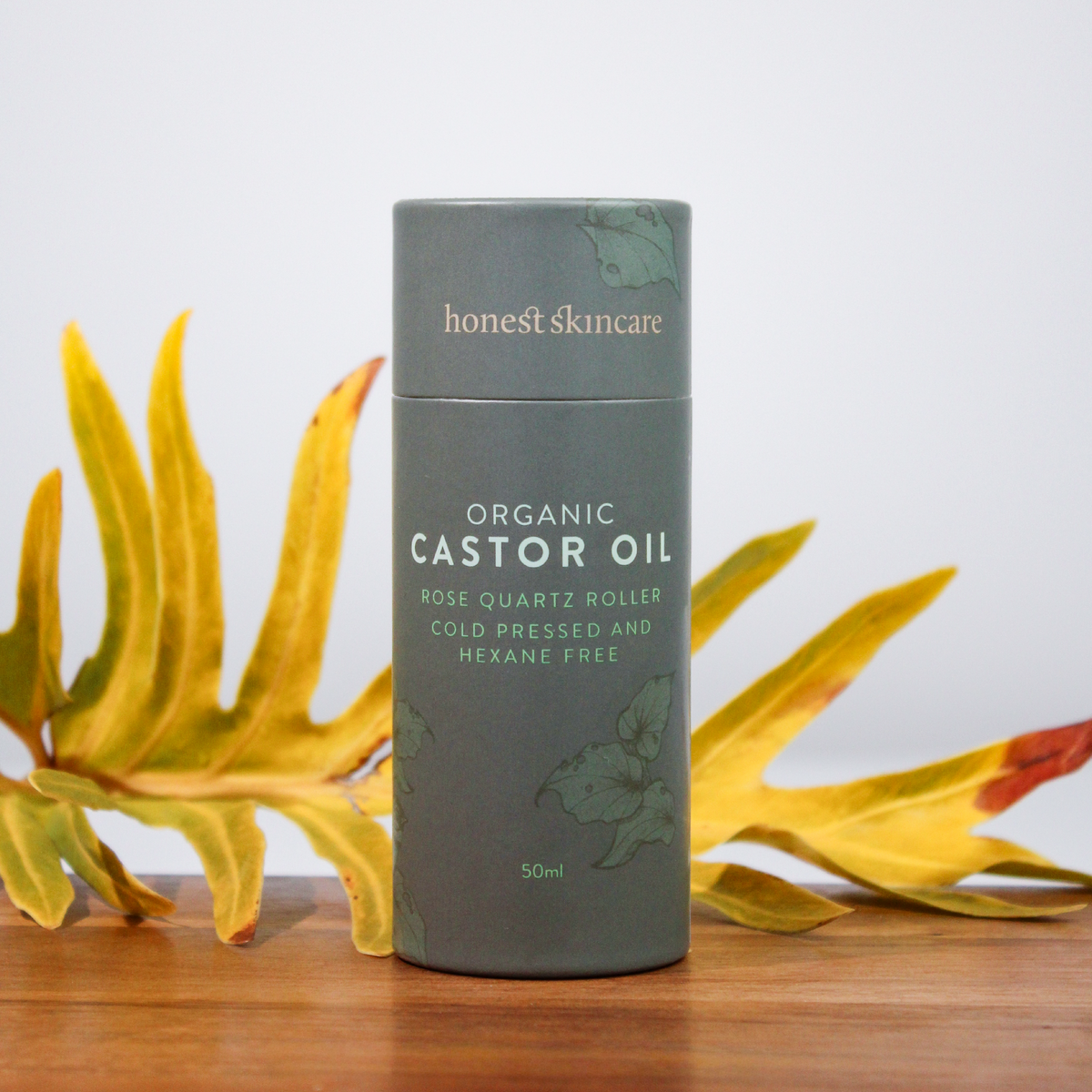 Rose Quartz Roller with Certified Organic Castor Oil packaging