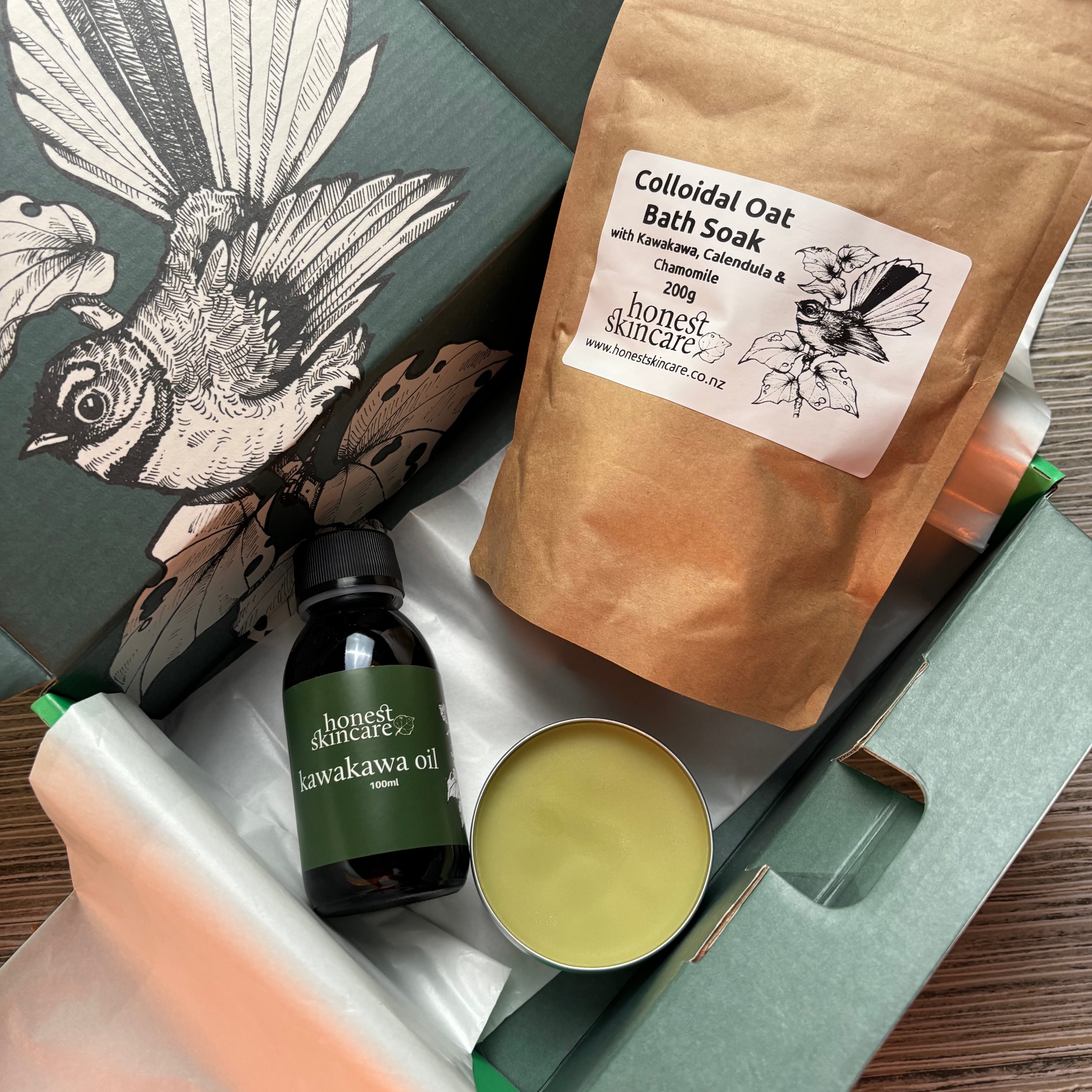 Collection of natural skincare products including a bottle, a bag, and a container on a wooden surface.