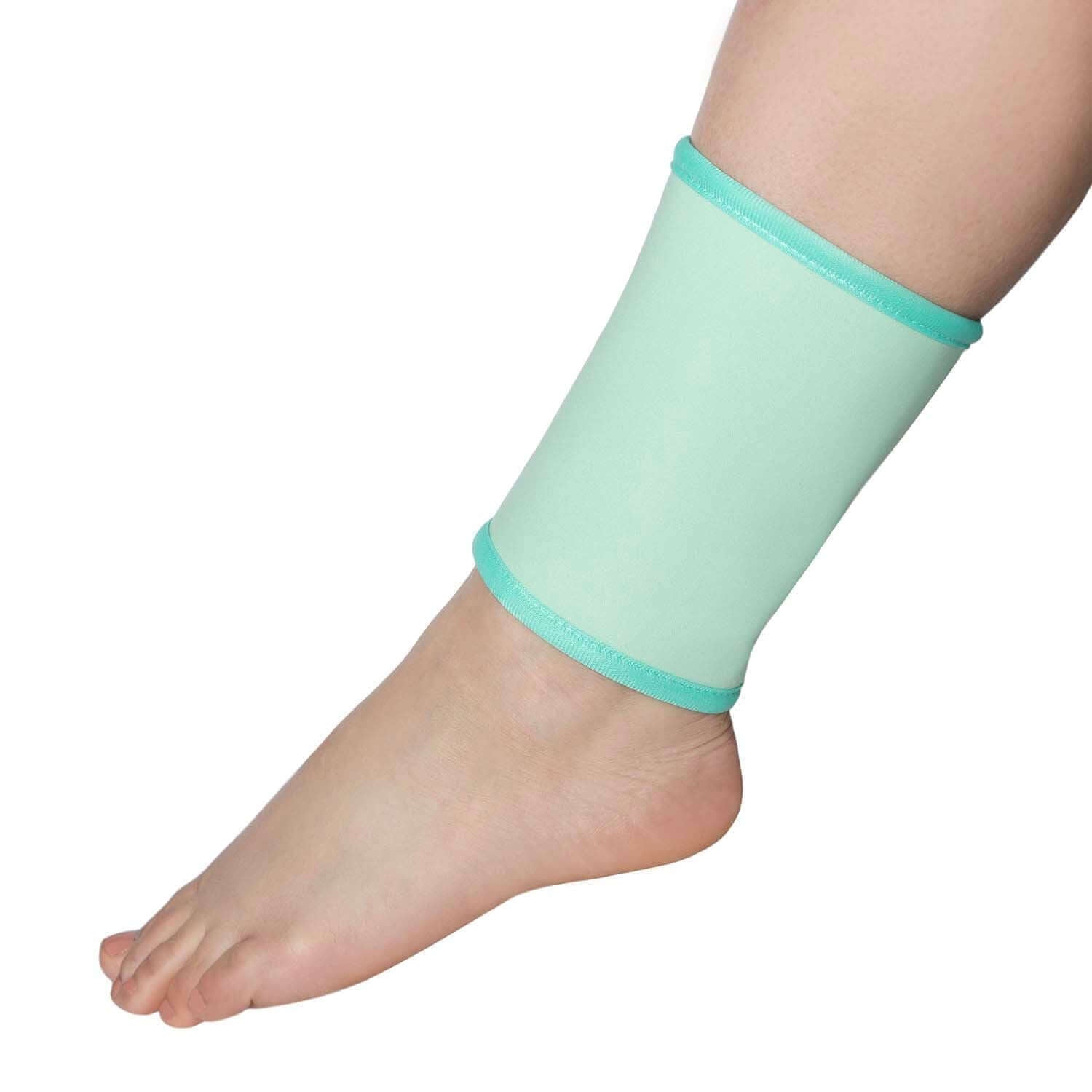 honest skincare Mint green ankle honest skincare joint wrap support band on a foot against a white background