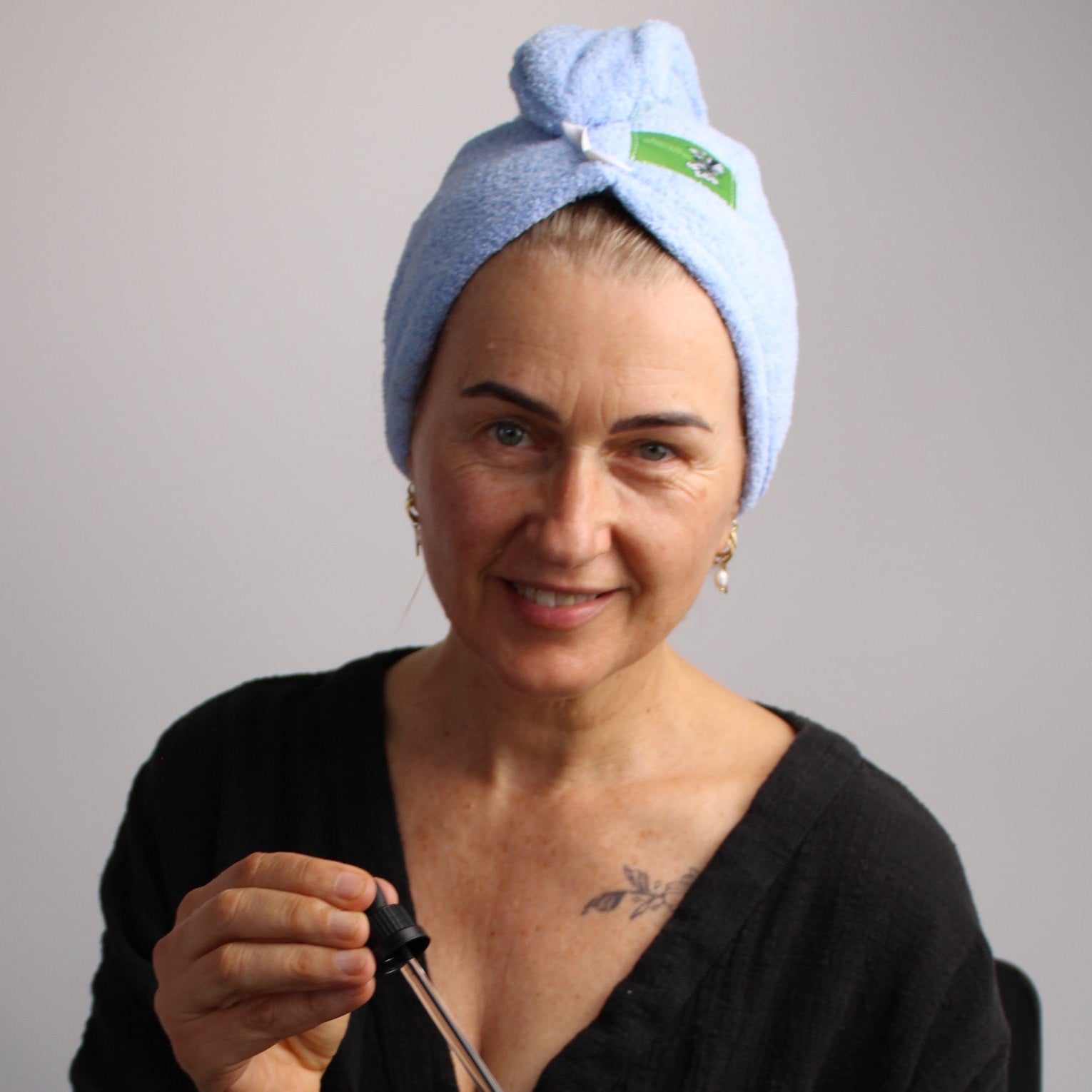 honest skincare hair wrap model smile