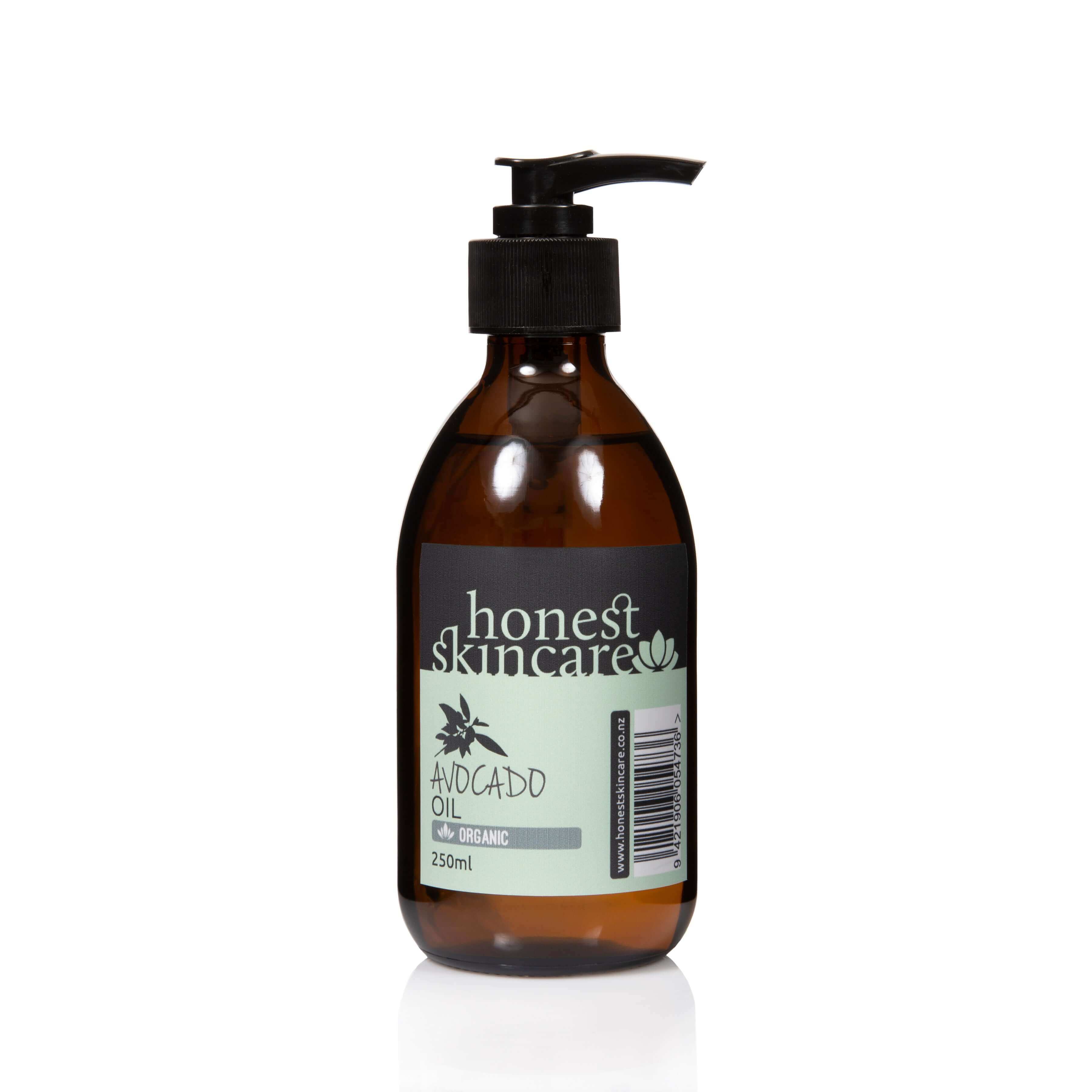 Brown bottle of avocado oil with a pump from 'honest skincare organic avocado oil' on a white background