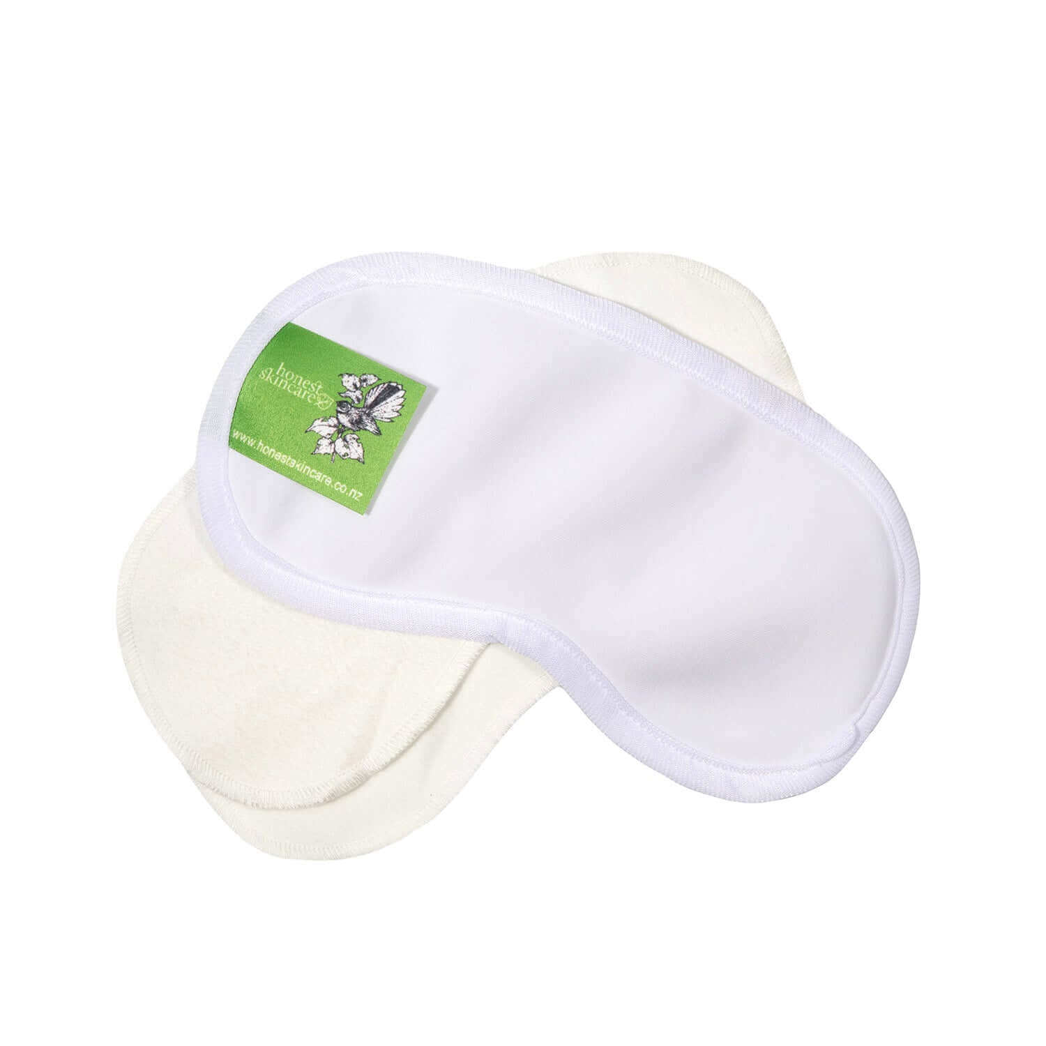 White eye mask with a green honest skincare label on a white background
